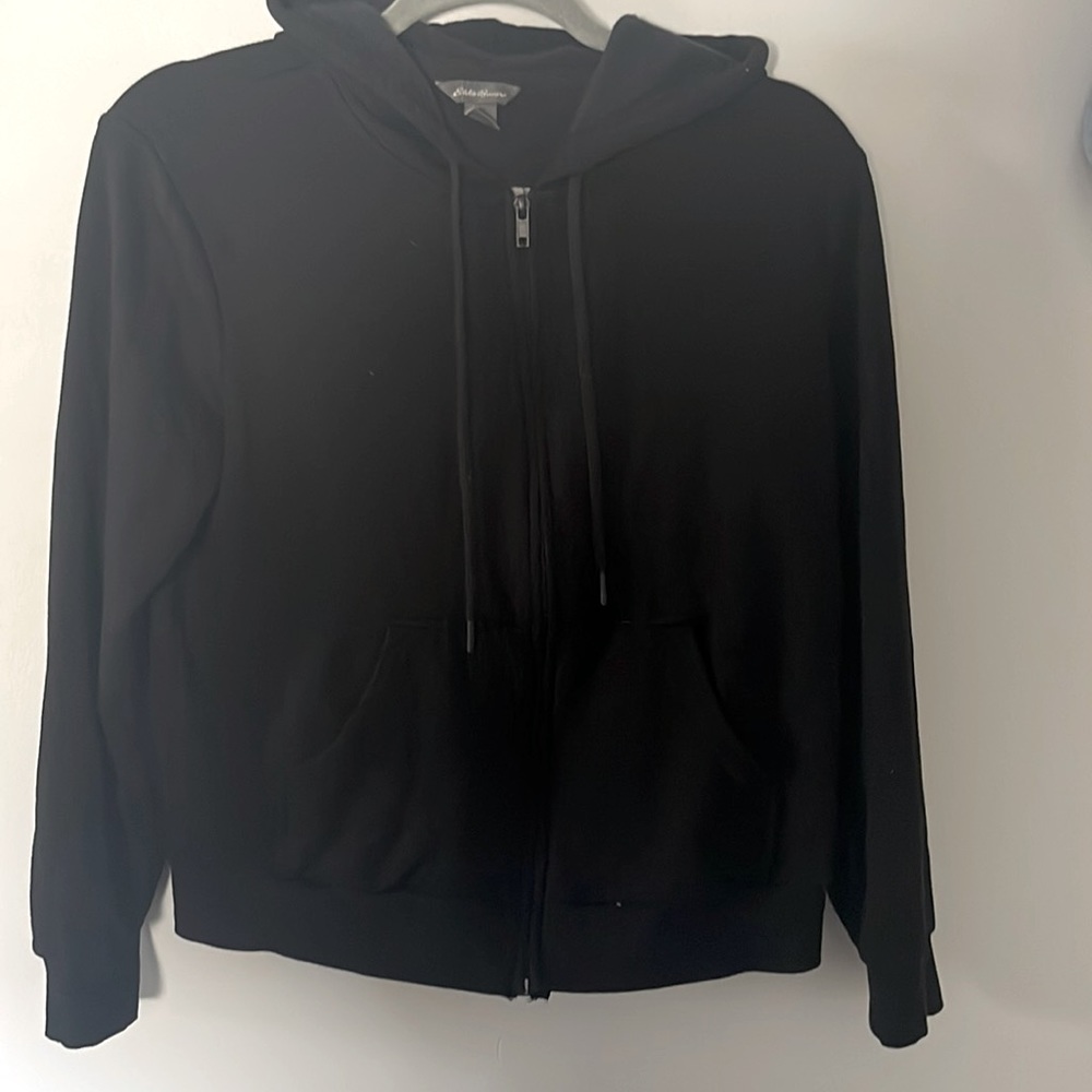 Eddie Bauer brand new women’s size small hoodie in black.  It is SO soft!